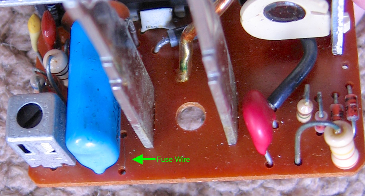Closeup of tiny, barely visible bare fuse wire on the circuit board of an LM 365 Lamp Module