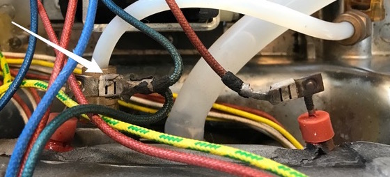 Overheated and discolored Quick Connect lugs attached to thermal block heater terminals.