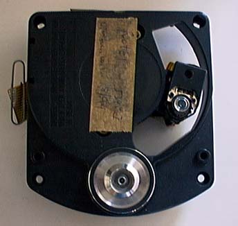 Philips CDM-4 swing-arm mechanism.