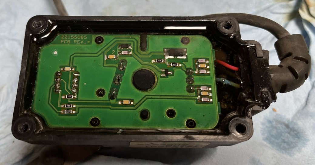 Circuit board side view of sensor with fresh potting compound fully cured: nice and clear