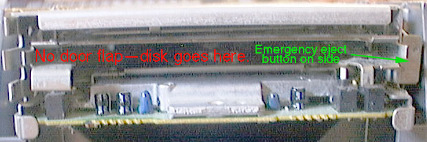 Auto-inject floppy picture, showing the lack of a dust door and the mechanical emergency eject button on the right side.