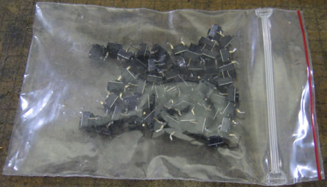 Bag of miniature SPST momentary “tact” pushbutton switches