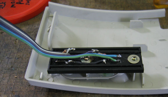 Rear view of final revised switch assembly, showing mounting of back plate, resistors, and ribbon cable