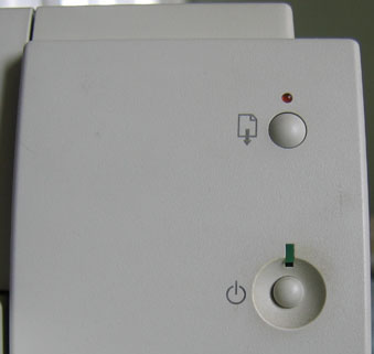 Closeup of switch panel area of printer front, after modification